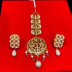 A pair of Gold Tone White Pearl Earrings with Maang Tikka for Wedding